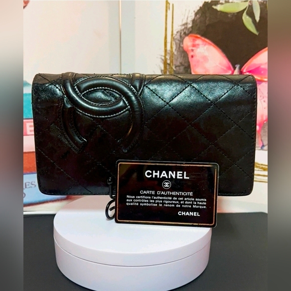 CHANEL Handbags - CHANEL Black Quilted Clutch